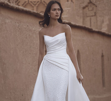 Blue by Enzoani at Champagne & Charlotte