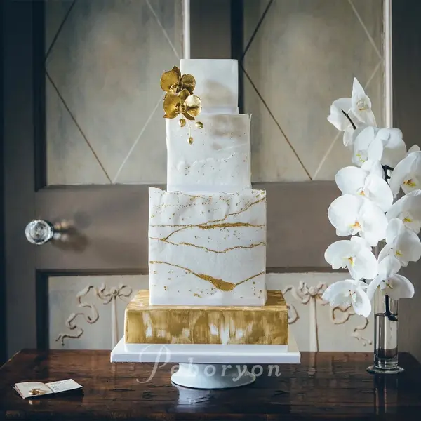 Peboryon - small_170426-peboryon-wedding-cake-collection-boconnoc-white-gold-orchid-cake.jpg.webp