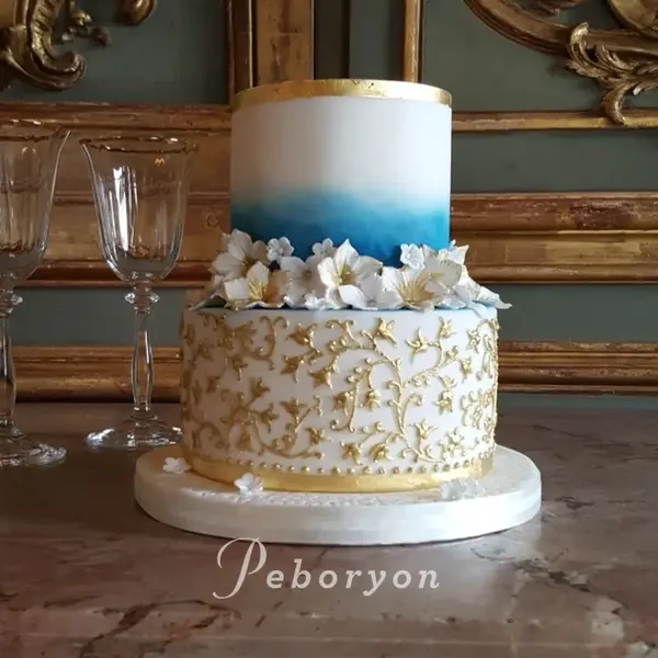 Peboryon - small_2018-Peboryon-Cornwall-London-Luxury-Wedding-Cake-Cliveden-House-Blue-Gold-Sugar-Flowers-Extreme-Cake-Makers-Channel-4.jpg.webp