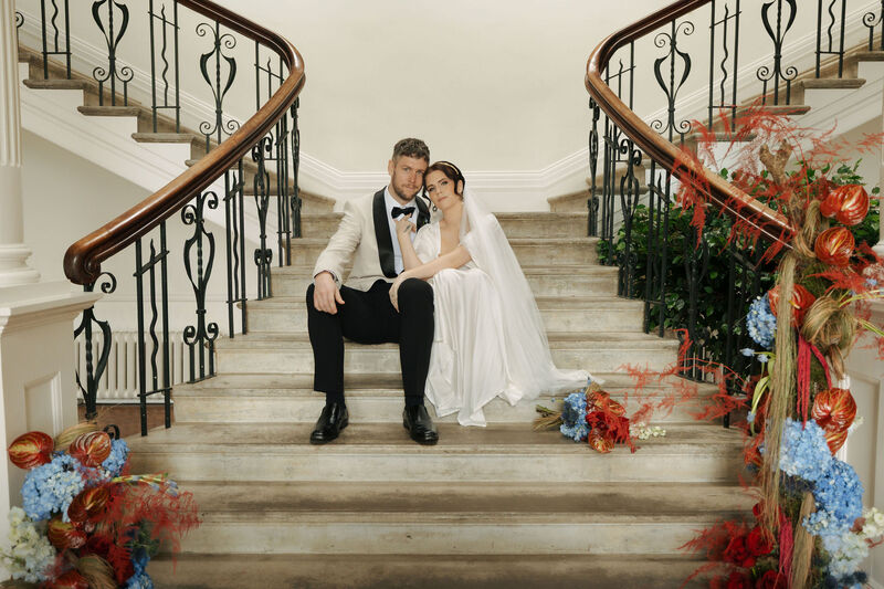 Bride and Groom on Scorrier House steps