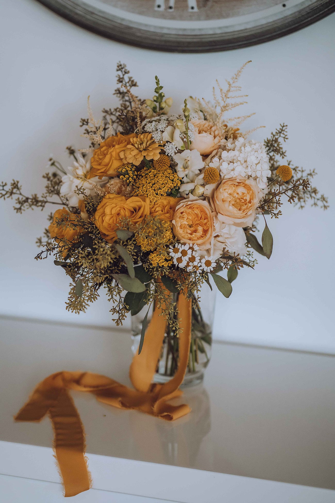 Bride's bouquet of yellow and white flowers 