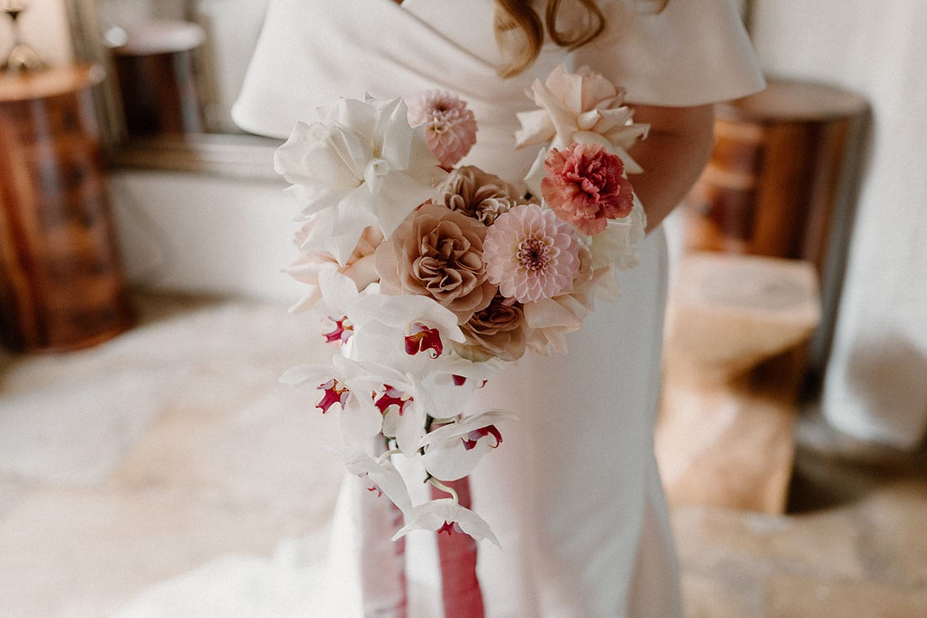 The bridal floral bouquet flowing down