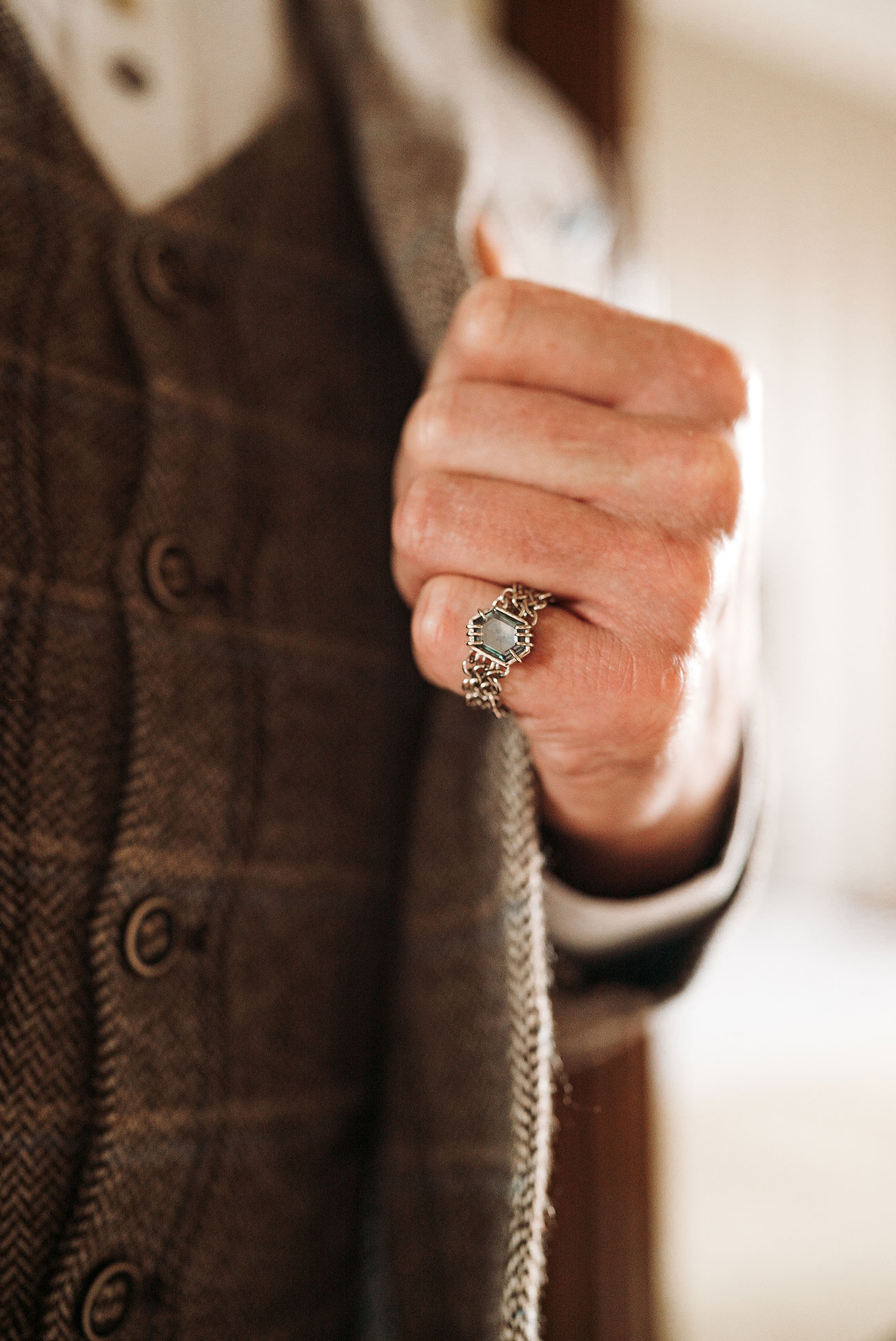 Groom showing his wedding ring