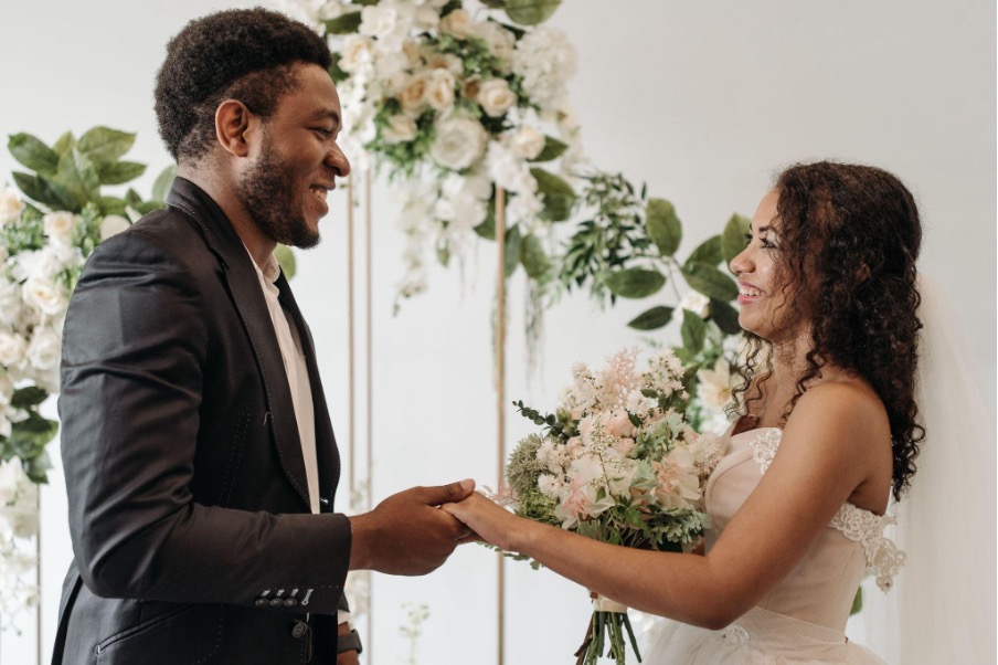 happy-groom-and-bride-holding-hands